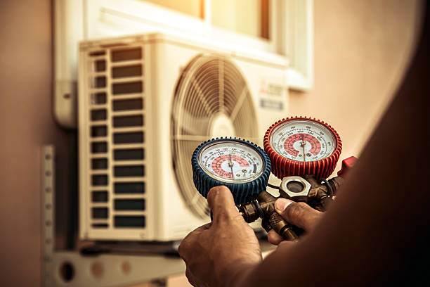 Professional Hvac Repair technician working in Yukon, MO